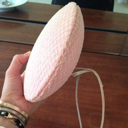 Student making a pink hat in Millinery workshop