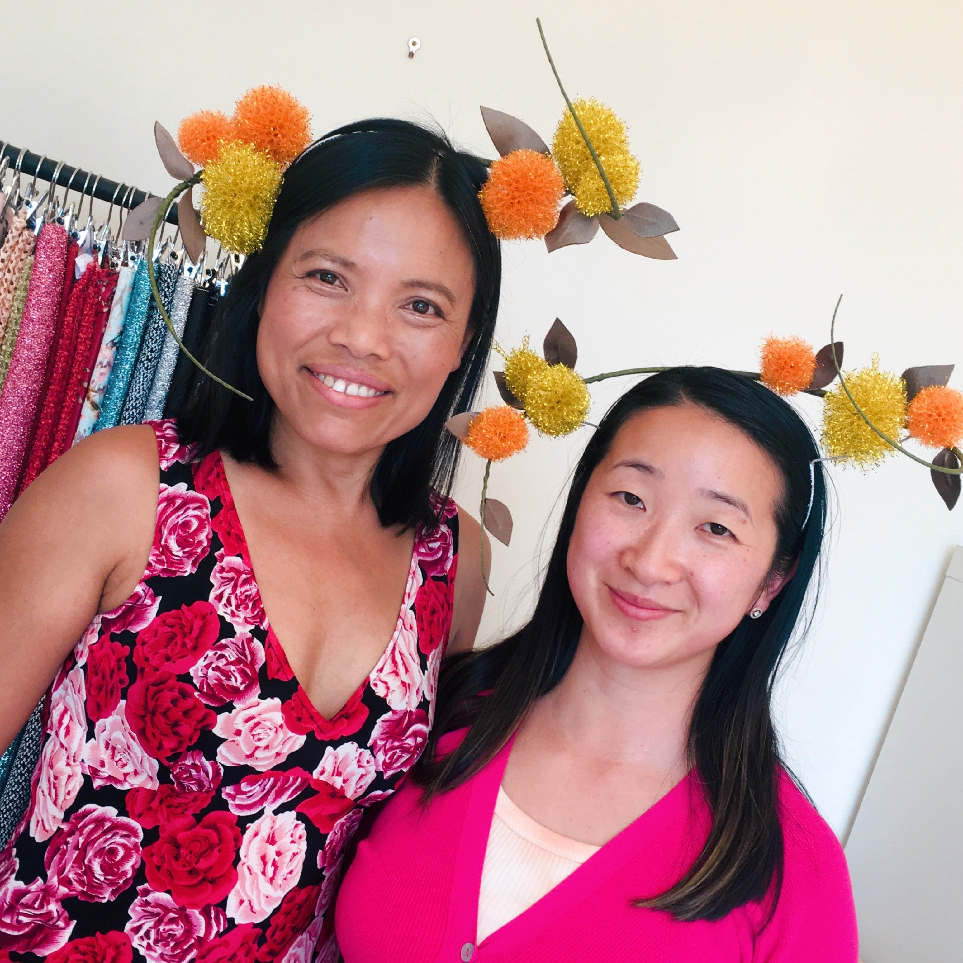 two women wearing their DIY millinery creations