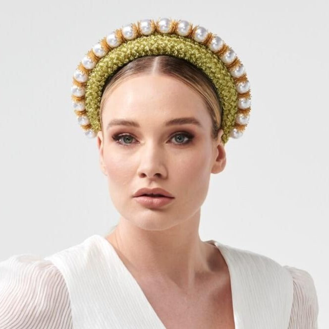 Headband style headpiece with an overlay of vintage straw cloth and adornment of uniformed glossy pearl beads. Colour: Cool avocado Attachment: Headband Sizing: one size fits most Spring racing carnival Millinery by Rebecca Share.  Dress in the latest designer hats and headpieces to complete your Fashions on the Field outfit.  Beautiful headbands, wide brim, fascinators and bridal collection.  Melbourne Cup, Derby races hat.
